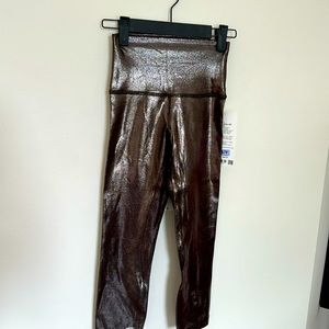 New with tags Lululemon shine align, high-rise, crop 21 inch size 2